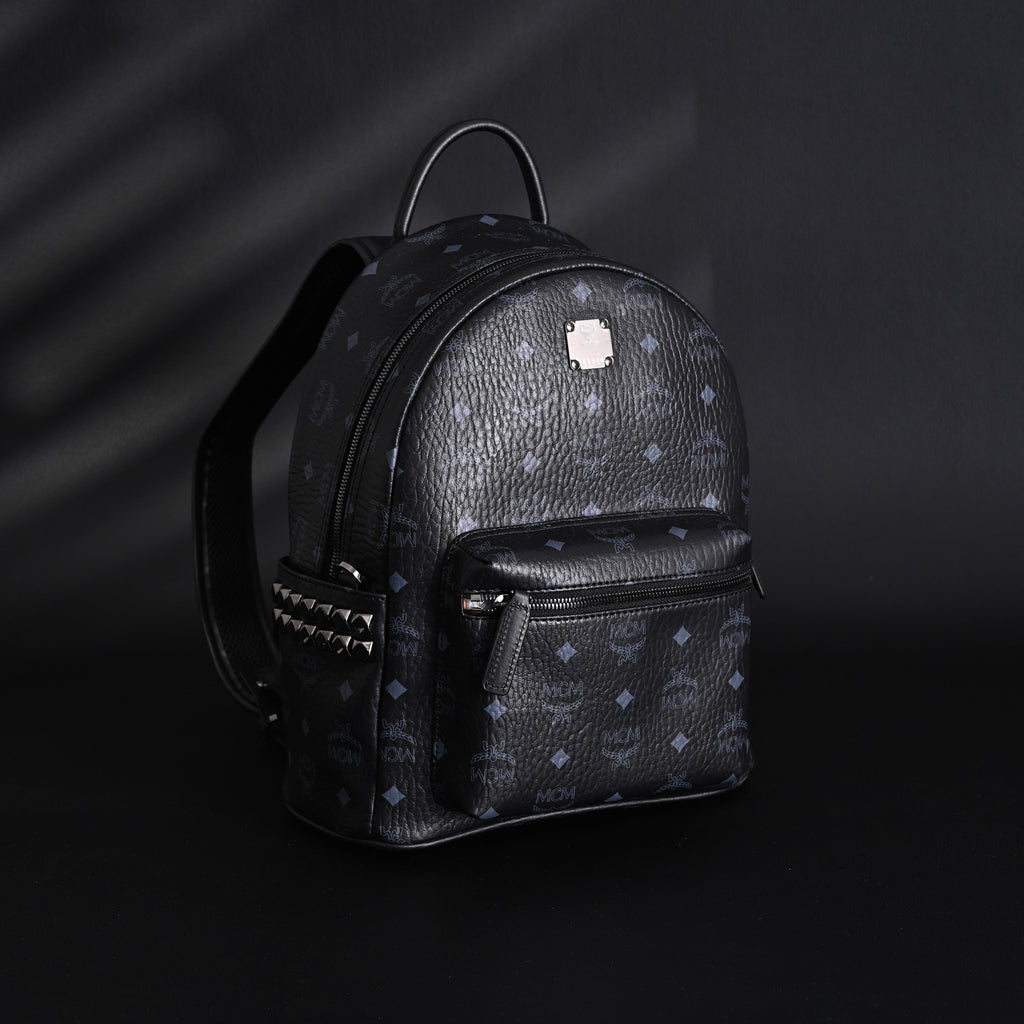 MCM Stark Visetos Medium Backpack ¨C Black Monogram with Studded Detailing