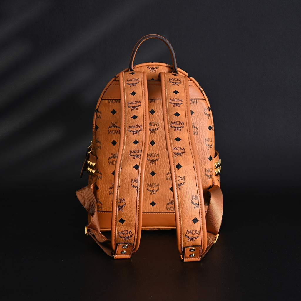 MCM Stark Visetos Medium Backpack ¨C Cognac Monogram with Gold-Tone Studs