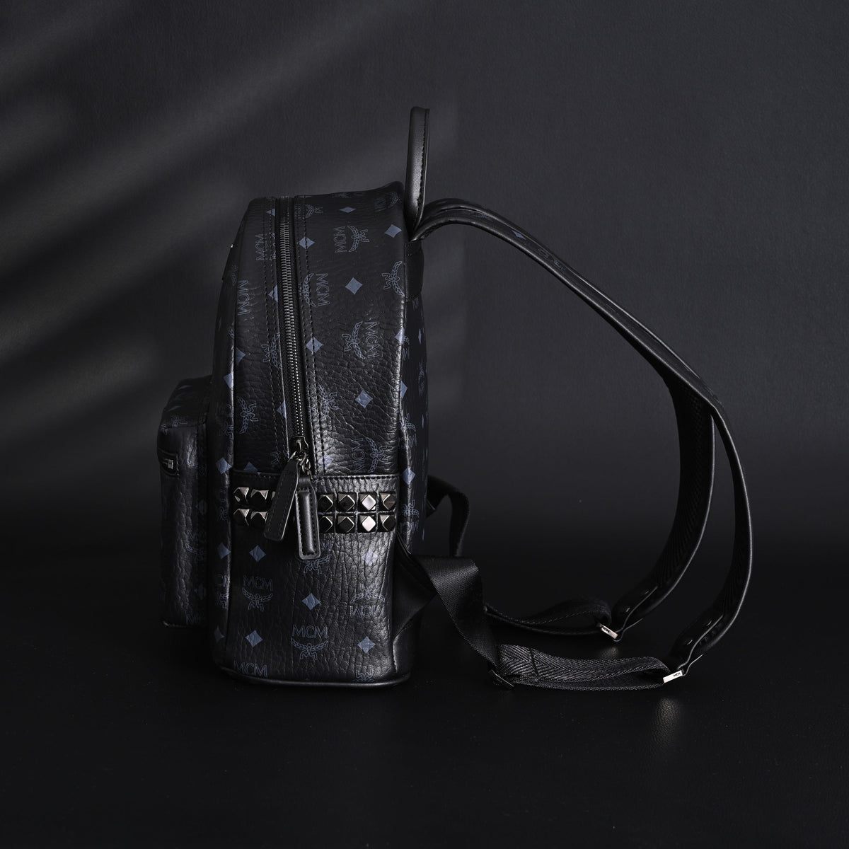 MCM Stark Visetos Medium Backpack ¨C Black Monogram with Studded Detailing
