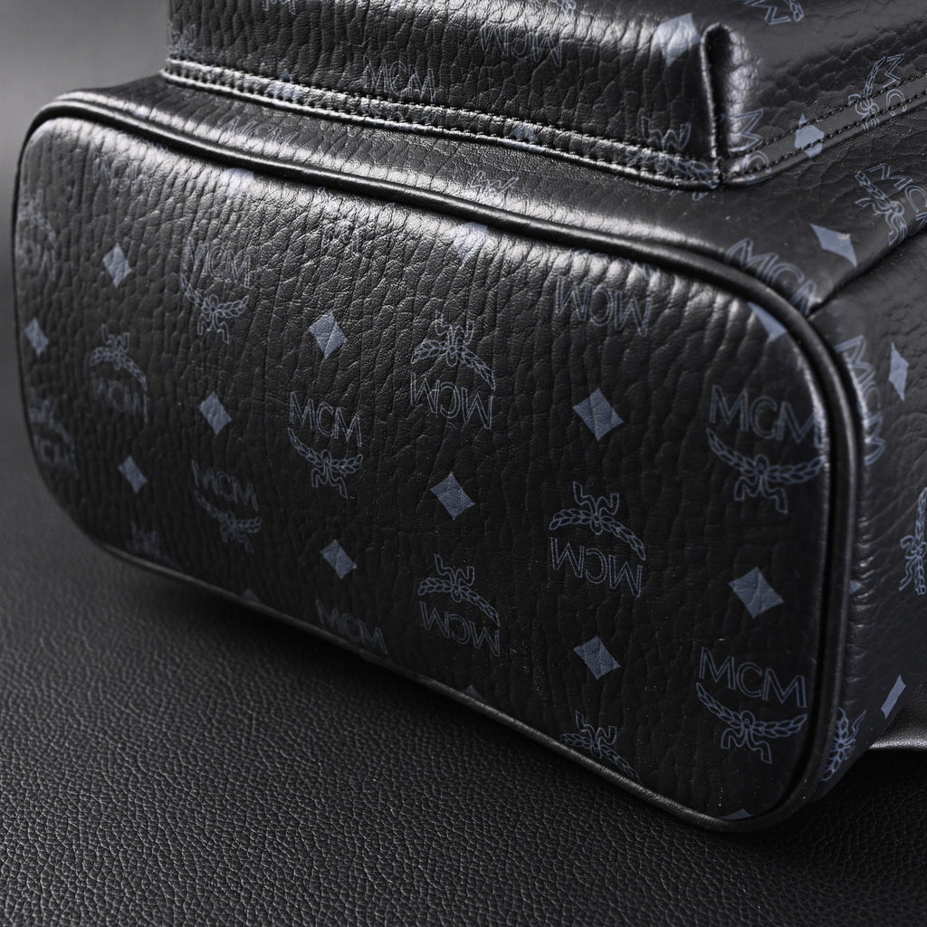 MCM Stark Visetos Medium Backpack ¨C Black Monogram with Studded Detailing