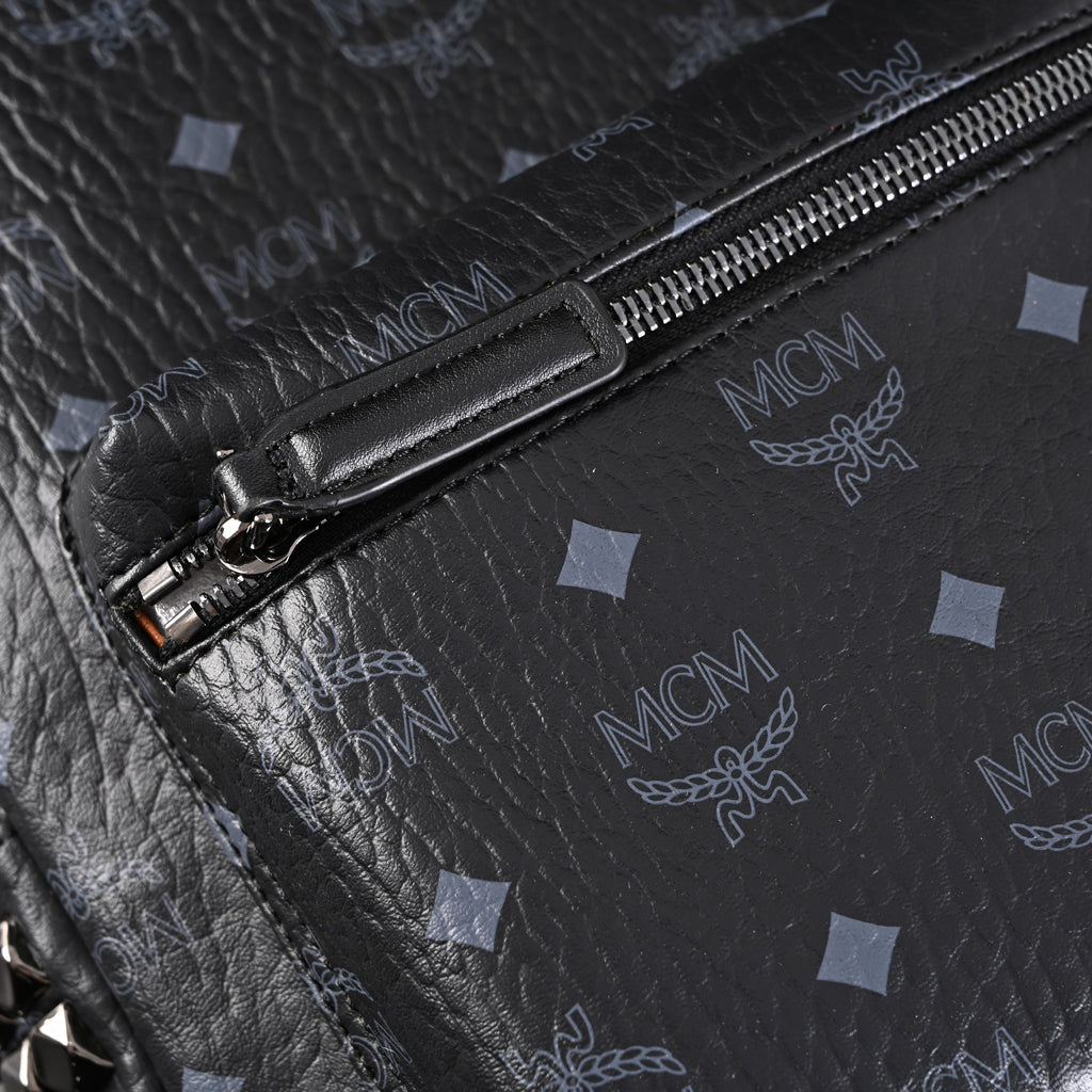 MCM Stark Visetos Medium Backpack ¨C Black Monogram with Studded Detailing