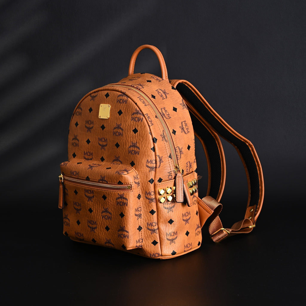MCM Stark Visetos Medium Backpack ¨C Cognac Monogram with Gold-Tone Studs