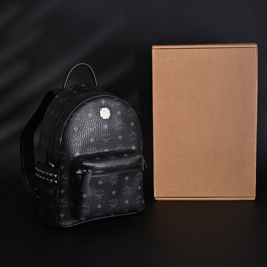 MCM Stark Visetos Medium Backpack ¨C Black Monogram with Studded Detailing