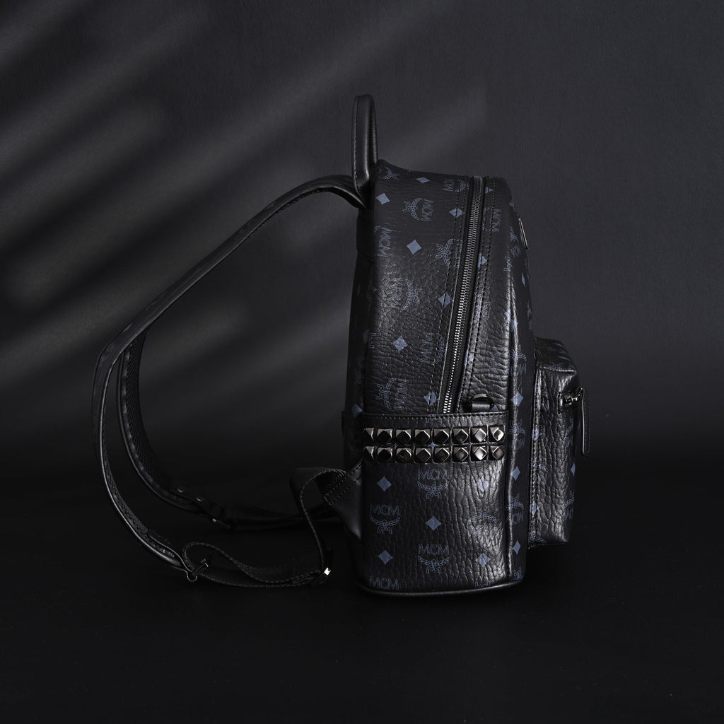 MCM Stark Visetos Medium Backpack ¨C Black Monogram with Studded Detailing