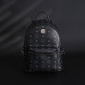MCM Stark Visetos Medium Backpack ¨C Black Monogram with Studded Detailing