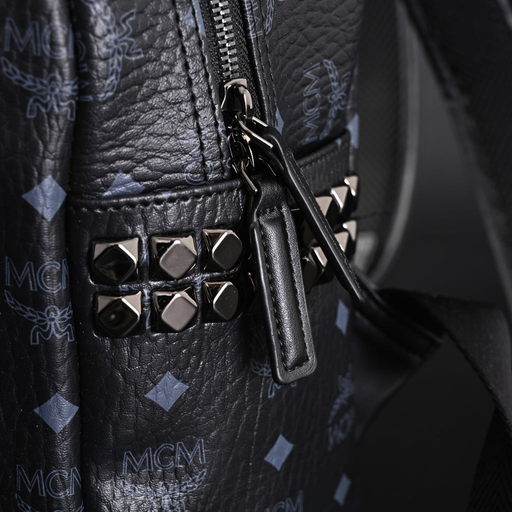 MCM Stark Visetos Medium Backpack ¨C Black Monogram with Studded Detailing