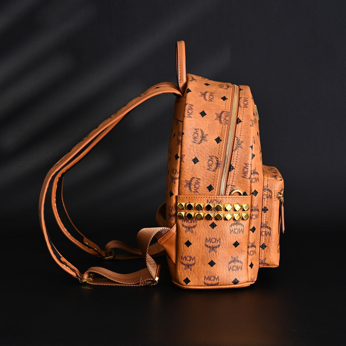 MCM Stark Visetos Medium Backpack ¨C Cognac Monogram with Gold-Tone Studs