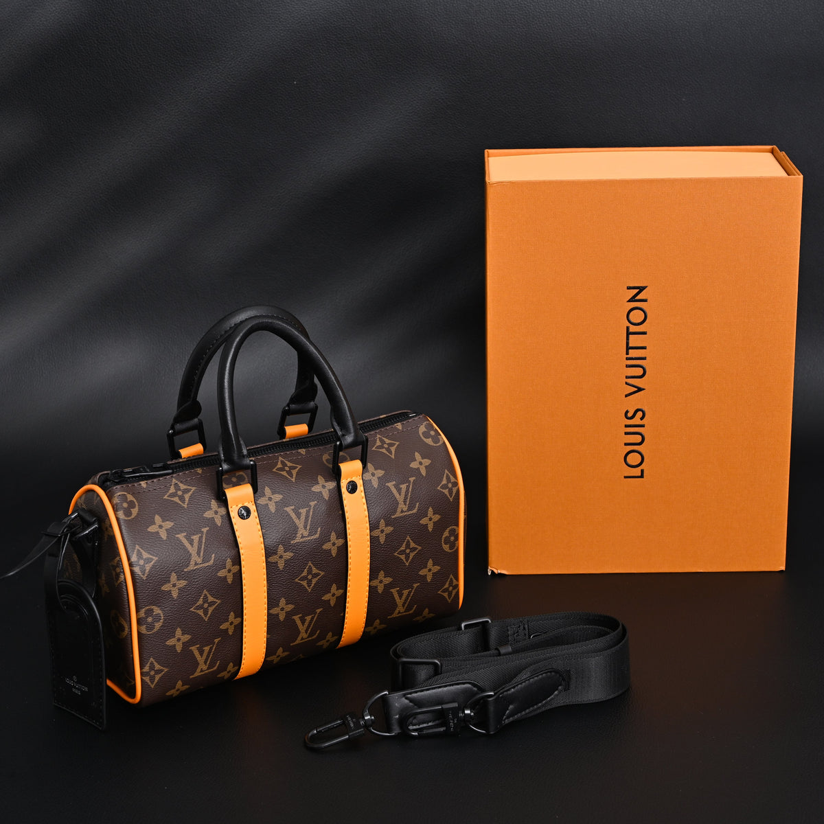 Louis Vuitton Keepall Bandouli¨¨re 50 ¨C Monogram Canvas with Neon Orange Trim