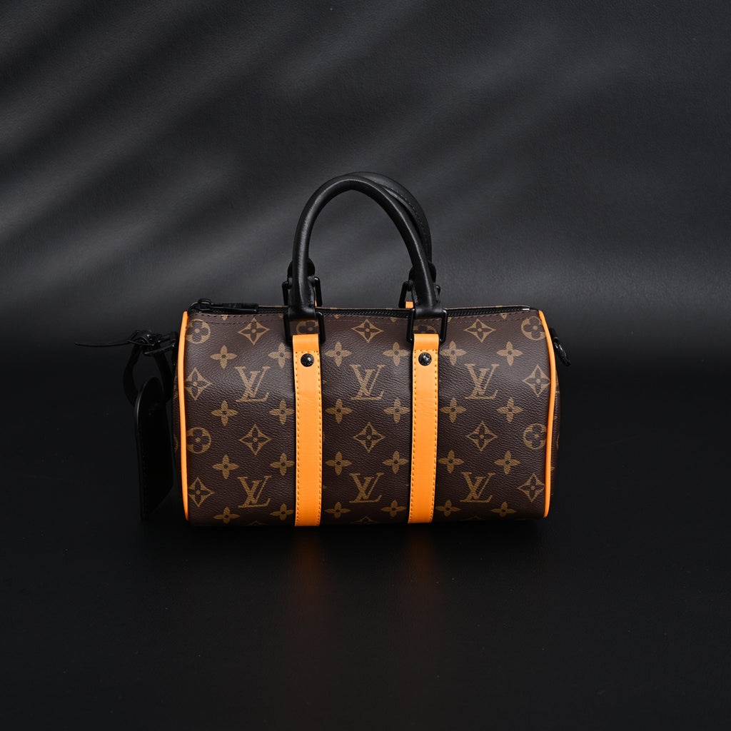 Louis Vuitton Keepall Bandouli¨¨re 50 ¨C Monogram Canvas with Neon Orange Trim