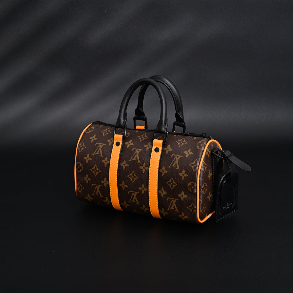 Louis Vuitton Keepall Bandouli¨¨re 50 ¨C Monogram Canvas with Neon Orange Trim