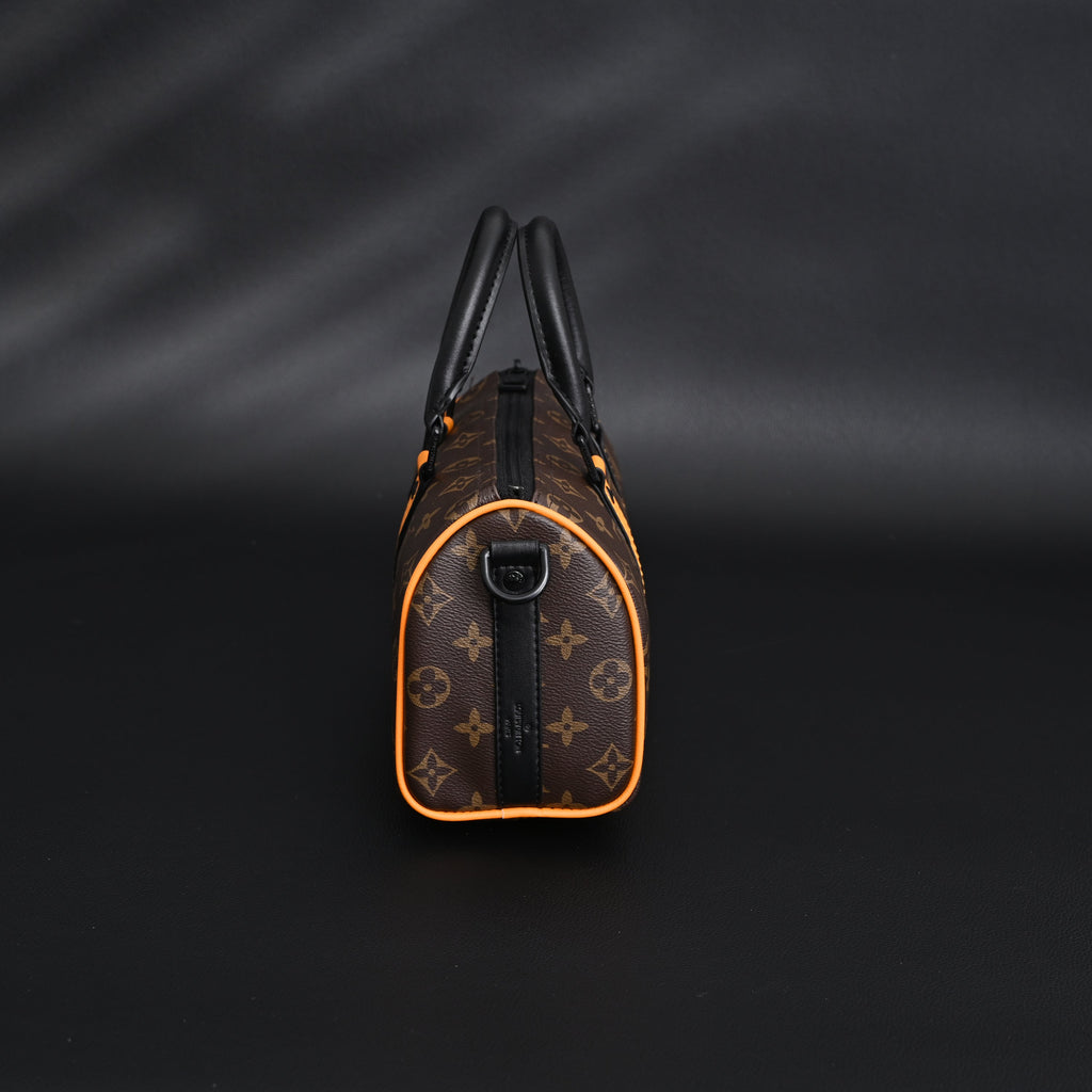 Louis Vuitton Keepall Bandouli¨¨re 50 ¨C Monogram Canvas with Neon Orange Trim