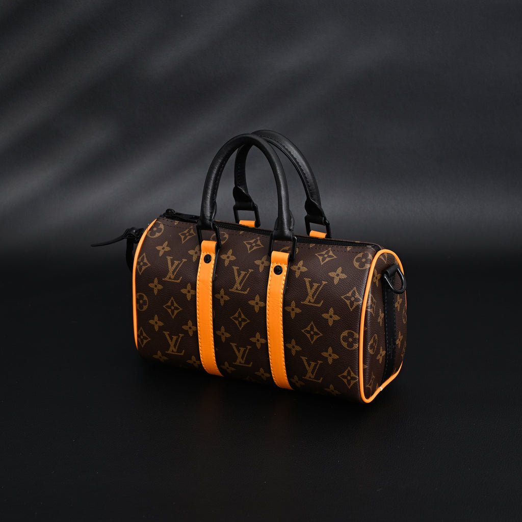 Louis Vuitton Keepall Bandouli¨¨re 50 ¨C Monogram Canvas with Neon Orange Trim
