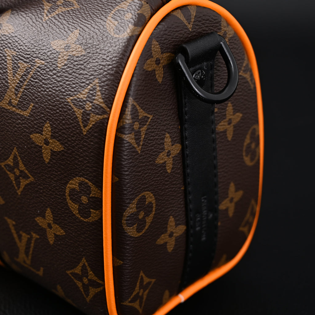 Louis Vuitton Keepall Bandouli¨¨re 50 ¨C Monogram Canvas with Neon Orange Trim