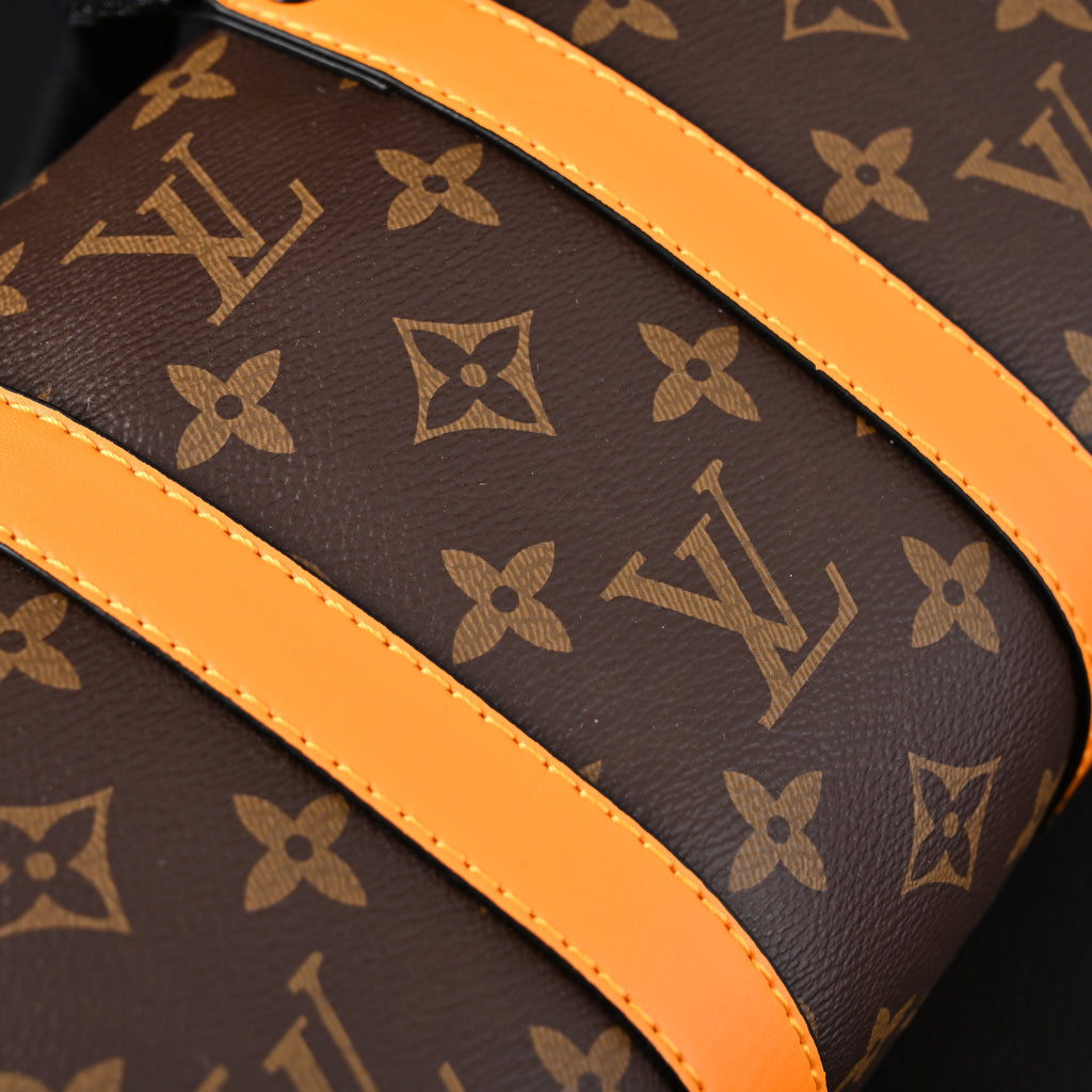 Louis Vuitton Keepall Bandouli¨¨re 50 ¨C Monogram Canvas with Neon Orange Trim