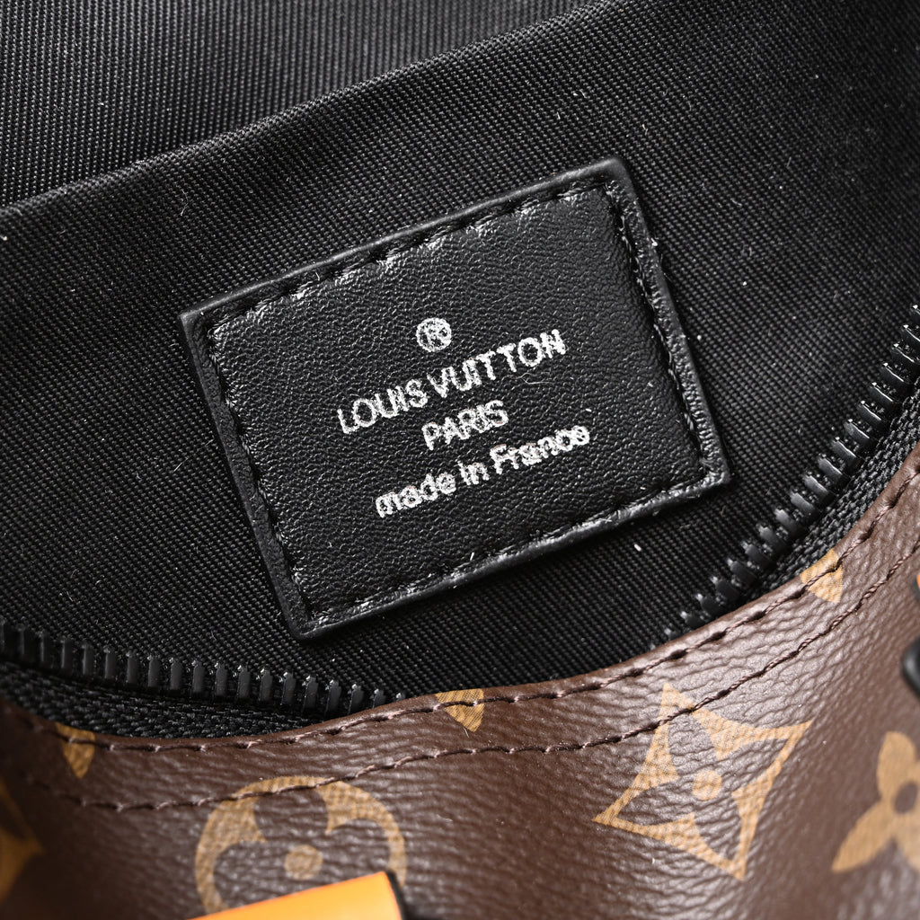 Louis Vuitton Keepall Bandouli¨¨re 50 ¨C Monogram Canvas with Neon Orange Trim