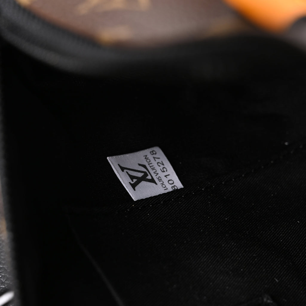 Louis Vuitton Keepall Bandouli¨¨re 50 ¨C Monogram Canvas with Neon Orange Trim