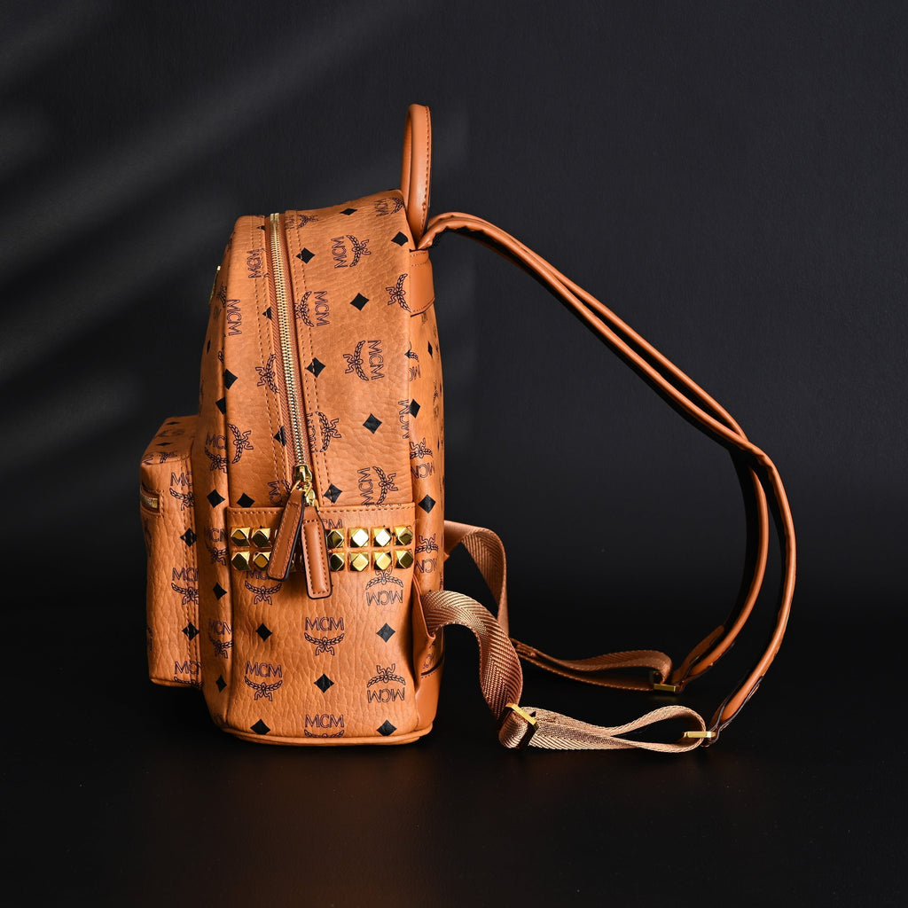 MCM Stark Visetos Medium Backpack ¨C Cognac Monogram with Gold-Tone Studs